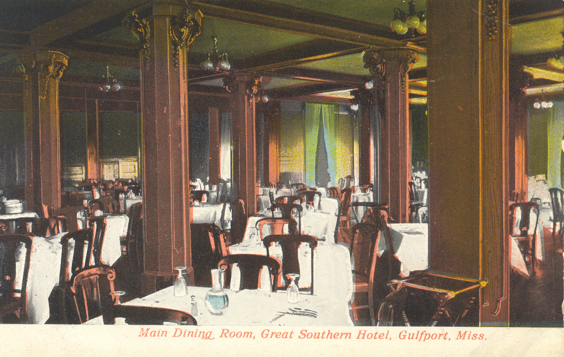 The main dining room of the Great Southern Hotel, with carved wooden columns, electric chandeliers and tables set with white linen